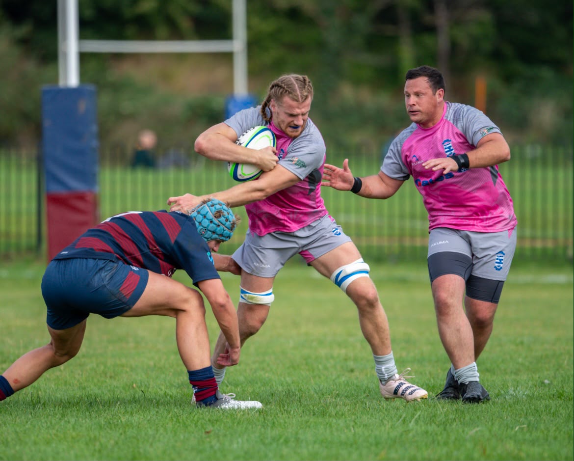 Wanstead RFC player running with the ball